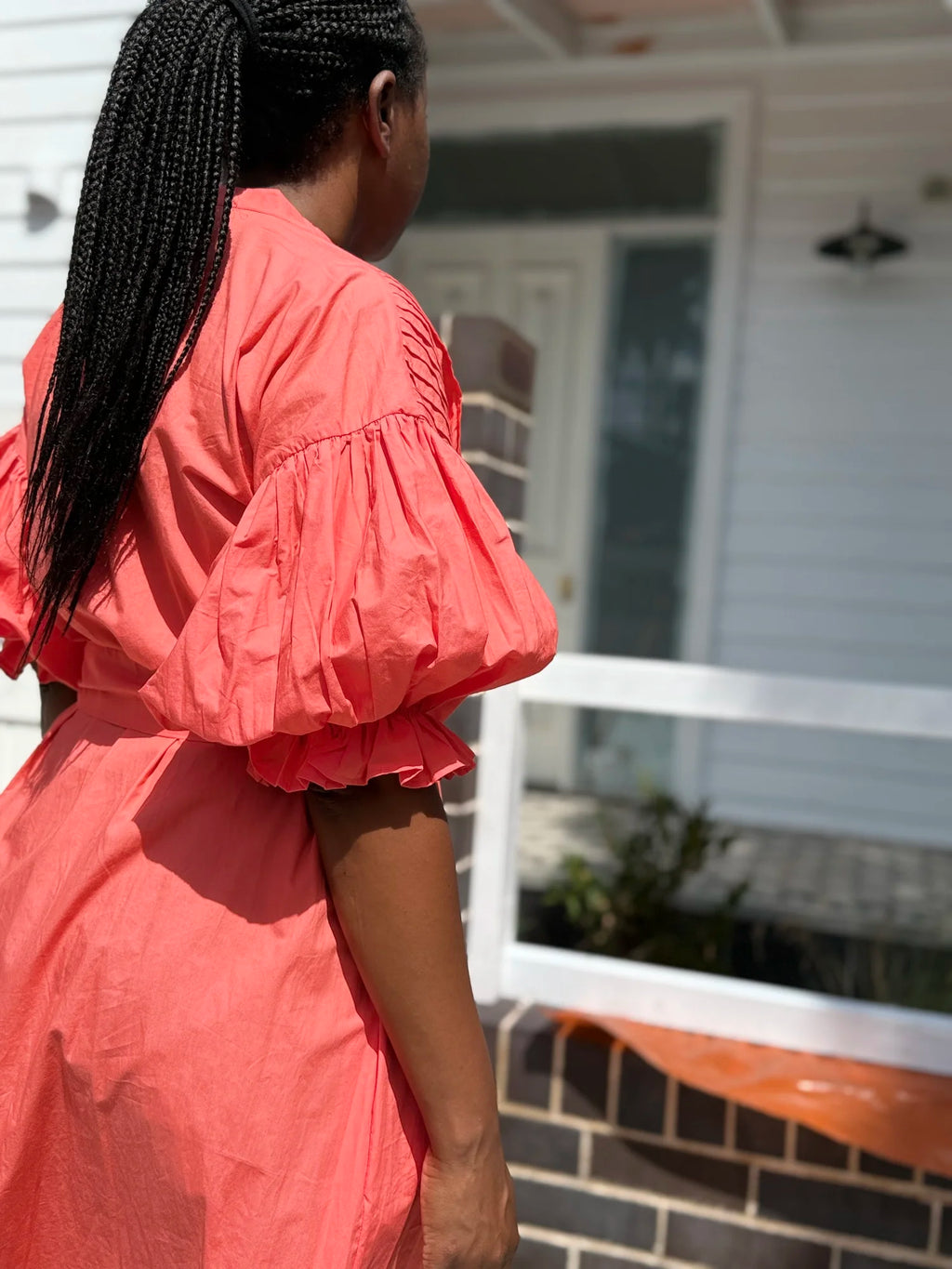 Coral Poplin cotton dress worn by model