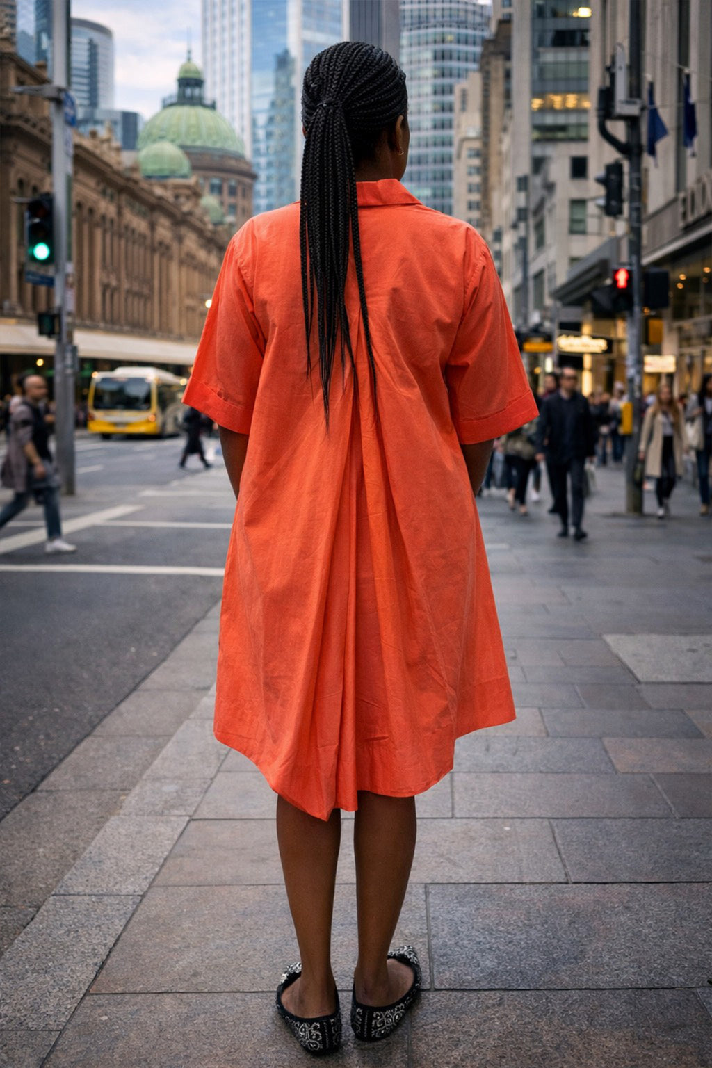 Coral Sway dress sculptural back pleat
