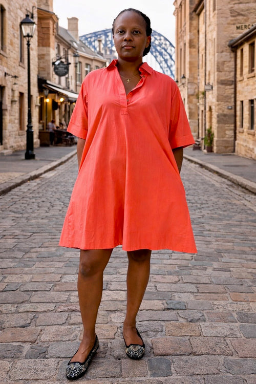 Coral Sway dress sculptural back pleat