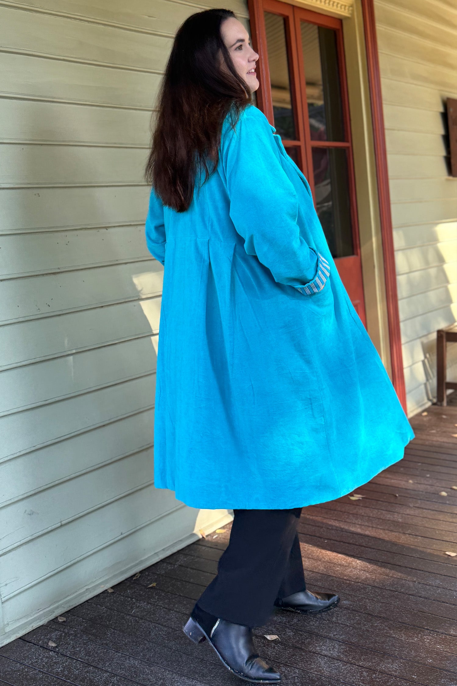 Laguna turquoise cotton jacket back view with box pleat
