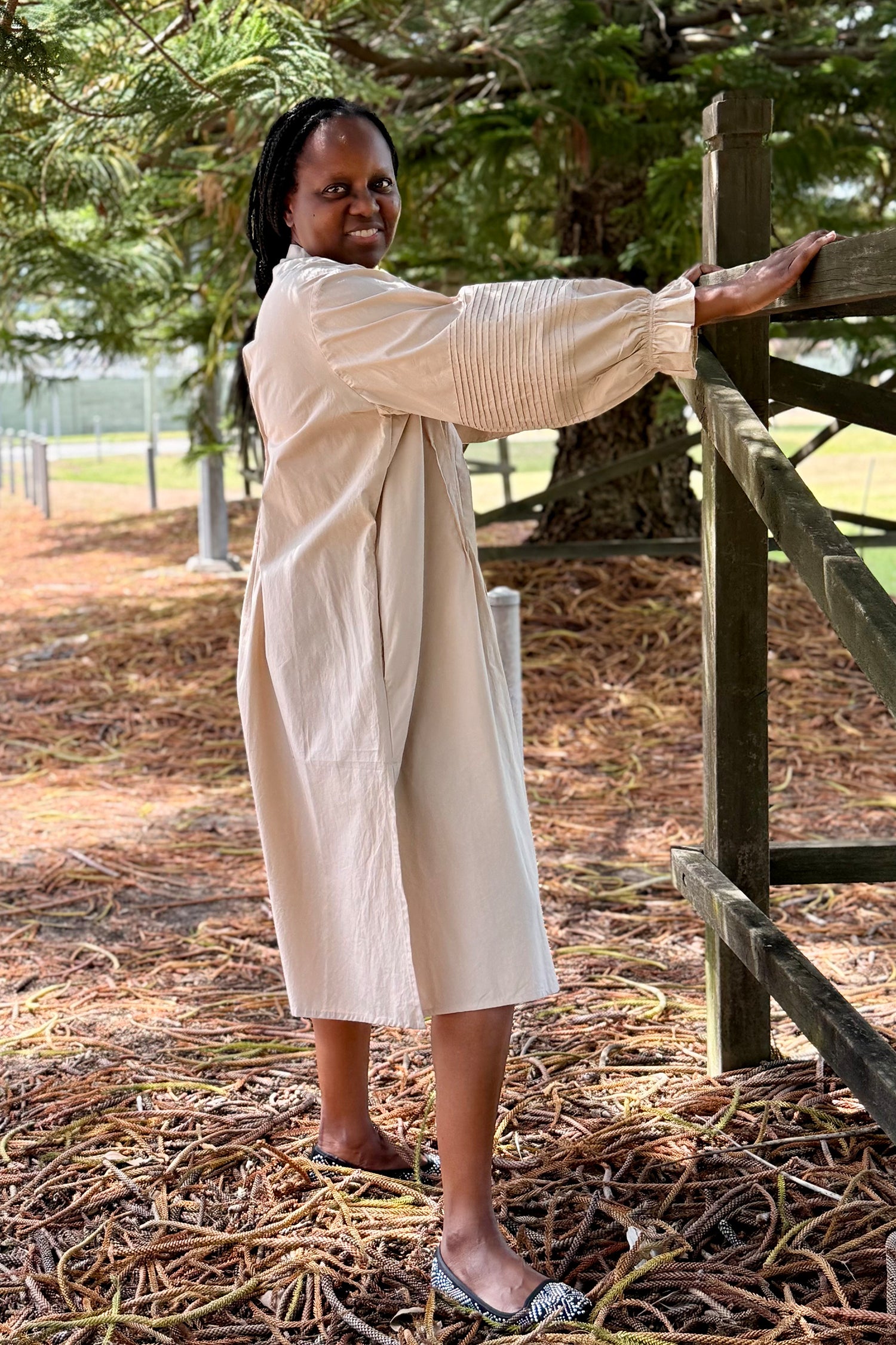 Sandra dress side view with pin-tuck sleeves